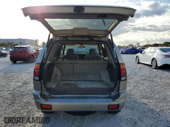 2002 Mitsubishi Montero z VIN JA4MT41R62J021195, wystawiony jako Copart lot #47021115 z przebiegiem 196 795 mil mil oraz Szkoda całkowita • Salvage title. Historia ofert i sprzedaży dostępna na DreamBid. Obrazek 6.