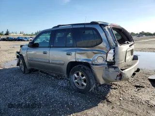 2002 GMC Envoy SLT with VIN 1GKDT13S122491329, listed as a Copart auction lot 75161714 with 149,659 mi miles and Salvage Title. Bid and sale history available at DreamBid. Image 2.