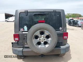 2017 Jeep Wrangler Unlimited Sahara with VIN 1C4BJWEGXHL595724, listed as a IAAI auction lot 42018264 with 95,948 mi miles. Bid and sale history available at carsss.com. Image 16.