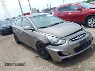2012 Hyundai Accent SE with VIN KMHCU5AE1CU006231, listed as a IAAI auction lot 42263193 with 104,845 mi miles and . Bid and sale history available at DreamBid. Image 1.