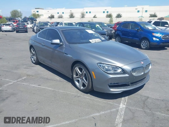 2013 BMW 6 Series 650i with VIN WBAYM9C53DDW20145, listed as a IAAI auction lot 42039618 with 66,684 mi miles and . Bid and sale history available at carsss.com. Image 1.