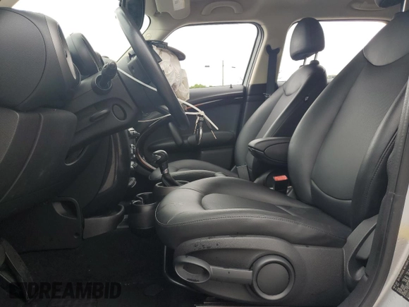 2012 MINI Countryman with VIN WMWZB3C5XCWM06778, listed as a Copart auction lot 61201285 with 64,676 mi miles and Salvage title. Bid and sale history available at DreamBid. Image 7.