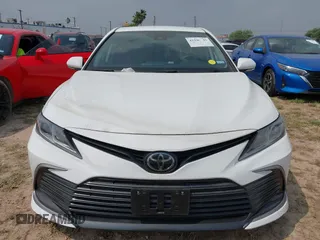 2024 Toyota Camry LE z VIN 4T1R11AK3RU223693, wystawiony jako IAAI lot #41920547 z przebiegiem Nie podano mil oraz . Historia ofert i sprzedaży dostępna na DreamBid. Obrazek 11.