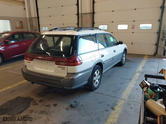 1999 Subaru Legacy Wagon Outback with VIN 4S3BG6852X7602214, listed as a IAAI auction lot 41429335 with 139,193 mi miles. Bid and sale history available at carsss.com. Image 4.