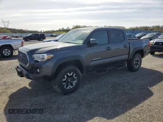 2019 Toyota Tacoma SR z VIN 3TMCZ5AN1KM266315, wystawiony jako Copart lot #49127735 z przebiegiem 90 479 mil mil oraz Szkoda całkowita • Salvage title. Historia ofert i sprzedaży dostępna na DreamBid. Obrazek 1.