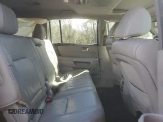 2013 Honda Pilot Touring with VIN 5FNYF4H92DB031771, listed as a Copart auction lot 50083125 with 229,059 mi miles and Salvage Title. Bid and sale history available at DreamBid. Image 11.