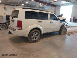2008 Dodge Nitro SXT with VIN 1D8GU28K48W272971, listed as a IAAI auction lot 41774435 with 225,071 mi miles. Bid and sale history available at carsss.com. Image 4.
