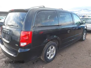 2012 Dodge Grand Caravan SXT with VIN 2C4RDGCG3CR318900, listed as a IAAI auction lot 41145958 with 201,117 mi miles and . Bid and sale history available at DreamBid. Image 4.