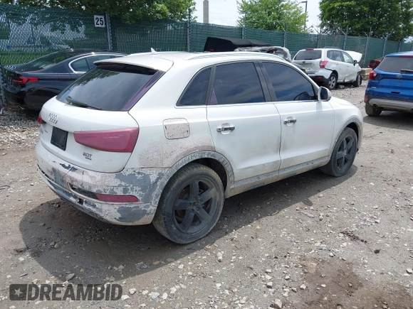 2015 Audi Q3 Premium Plus z VIN WA1EFCFS8FR001278, wystawiony jako IAAI lot #42475043 z przebiegiem 125 417 mil mil oraz . Historia ofert i sprzedaży dostępna na DreamBid. Obrazek 4.
