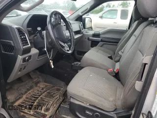 2015 Ford F-150 XLT with VIN 1FTEX1EP1FKF19892, listed as a Copart auction lot 57976715 with 179,507 mi miles and Salvage title. Bid and sale history available at DreamBid. Image 7.