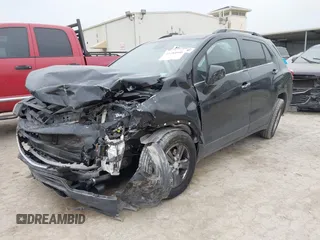 2018 Chevrolet Trax LT with VIN 3GNCJLSBXJL183879, listed as a IAAI auction lot 41288990 with 127,310 mi miles and . Bid and sale history available at DreamBid. Image 2.