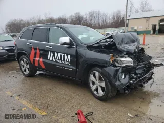 2014 Jeep Grand Cherokee Overland with VIN 1C4RJFCG0EC448860, listed as a Copart auction lot 42610135 with 0 mi miles and Salvage Title. Bid and sale history available at carsss.com. Image 4.