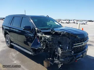 2021 Chevrolet Tahoe Z71 with VIN 1GNSKPKD2MR124128, listed as a IAAI auction lot 41874524 with 75,066 mi miles. Bid and sale history available at carsss.com. Image 1.