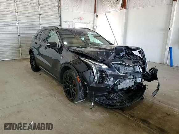 2023 Cadillac XT4 AWD Sport z VIN 1GYFZFR41PF103650, wystawiony jako Copart lot #59321355 z przebiegiem 27 092 mil mil oraz Szkoda całkowita • Salvage title. Historia ofert i sprzedaży dostępna na DreamBid. Obrazek 13.
