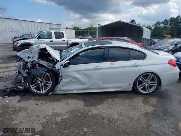 2017 BMW 6 Series 640i xDrive with VIN WBA6D2C5XHGT66310, listed as a IAAI auction lot 40489981 with 1 mi miles. Bid and sale history available at carsss.com. Image 13.