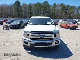 2018 Ford F-150 XL with VIN 1FTFX1C57JKF08037, listed as a IAAI auction lot 41863806 with 195,725 mi miles and . Bid and sale history available at DreamBid. Image 12.