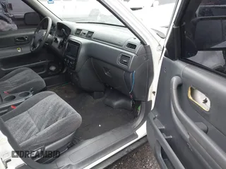 2000 Honda CR-V LX with VIN JHLRD2844YC010848, listed as a IAAI auction lot 41678830 with 173,137 mi miles. Bid and sale history available at carsss.com. Image 5.