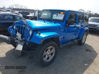 2015 Jeep Wrangler Unlimited Altitude с VIN 1C4HJWEG3FL584314, выставлен на аукционе IAAI как лот 41802581 с пробегом 145 143 миль миль и . История ставок и продаж доступна на DreamBid. Изображение 2.