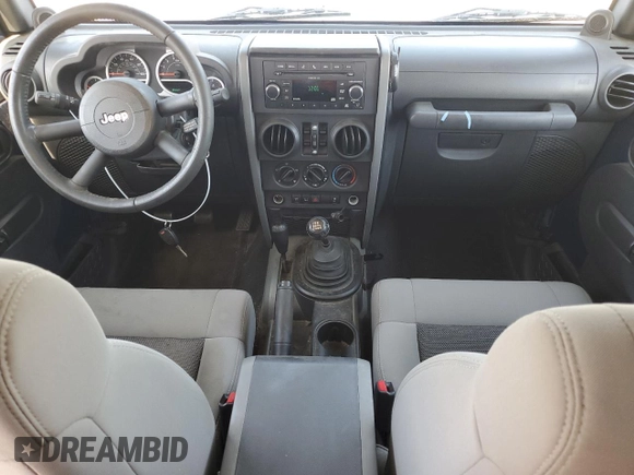 2010 Jeep Wrangler Unlimited Rubicon with VIN 1J4HA6H15AL225234, listed as a Copart auction lot 61270505 with 110,332 mi miles and Clean title. Bid and sale history available at DreamBid. Image 8.