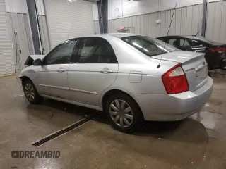 2005 Kia Spectra LX with VIN KNAFE121655148281, listed as a Copart auction lot 76677864 with 115,299 mi miles and Clean Title. Bid and sale history available at carsss.com. Image 2.
