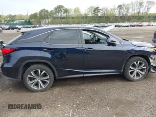 2019 Lexus RX 350 z VIN 2T2BZMCAXKC210846, wystawiony jako IAAI lot #42166336 z przebiegiem 30 398 mil mil oraz . Historia ofert i sprzedaży dostępna na DreamBid. Obrazek 13.