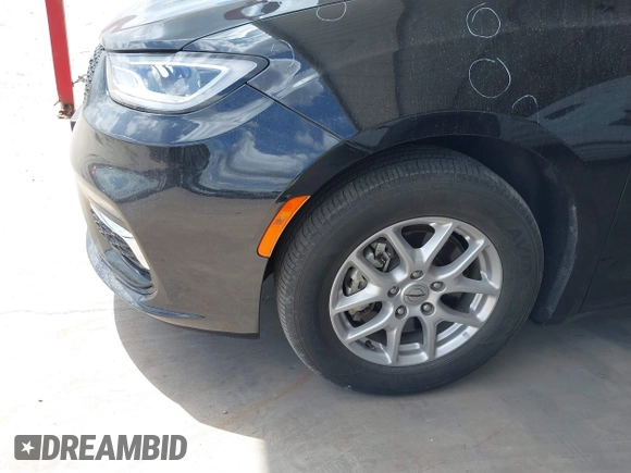 2023 Chrysler Pacifica Touring L with VIN 2C4RC1BG1PR550628, listed as a IAAI auction lot 42553430 with 61,773 mi miles and . Bid and sale history available at DreamBid. Image 18.