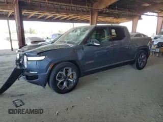 2022 Rivian R1T Adventure Package with VIN 7FCTGAAA9NN008771, listed as a Copart auction lot 42402765 with 31,006 mi miles and Salvage Title. Bid and sale history available at carsss.com. Image 1.