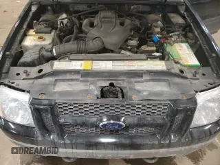 2001 Ford Explorer Sport Trac z VIN 1FMZU77E01UA08076, wystawiony jako Copart lot #45813815 z przebiegiem 158 780 mil mil oraz Czysty tytuł • Clean title. Historia ofert i sprzedaży dostępna na DreamBid. Obrazek 11.