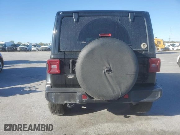 2021 Jeep Wrangler Unlimited Sahara Altitude with VIN 1C4HJXEN3MW659058, listed as a Copart auction lot 48786955 with 88,618 mi miles and Salvage title. Bid and sale history available at DreamBid. Image 6.