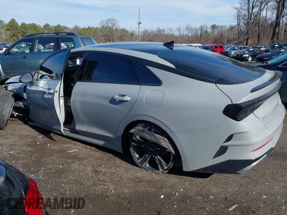 2023 Kia K5 GT-Line z VIN 5XXG64J28PG188506, wystawiony jako IAAI lot #41854184 z przebiegiem 18 967 mil mil oraz . Historia ofert i sprzedaży dostępna na DreamBid. Obrazek 3.