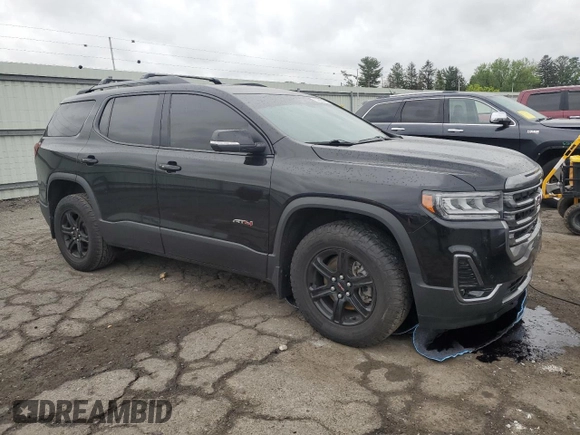 2021 GMC Acadia AT4 with VIN 1GKKNLLS5MZ168635, listed as a Copart auction lot 55988445 with 106,777 mi miles and Salvage title. Bid and sale history available at DreamBid. Image 4.