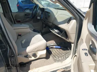2003 Ford F-150 XLT with VIN 1FTRW07613KC71609, listed as a IAAI auction lot 42186741 with 190,591 mi miles. Bid and sale history available at carsss.com. Image 5.