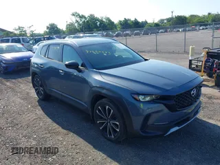 2023 Mazda CX-50 Meridian Edition with VIN 7MMVABXY9PN118958, listed as a IAAI auction lot 42557693 with 29,796 mi miles and . Bid and sale history available at DreamBid. Image 1.