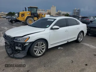2017 Volkswagen Passat SE with VIN 1VWGT7A31HC031028, listed as a Copart auction lot 58965655 with 127,712 mi miles and Salvage title. Bid and sale history available at DreamBid. Image 1.