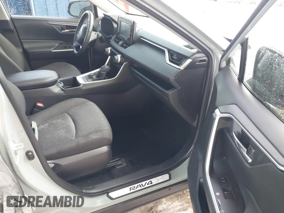2022 Toyota RAV4 Hybrid XLE with VIN JTMRWRFV9NJ054668, listed as a IAAI auction lot 42606261 with 61,794 mi miles and . Bid and sale history available at DreamBid. Image 5.