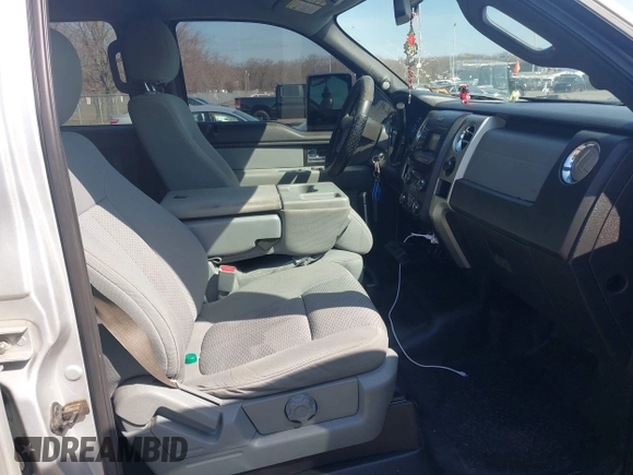 2014 Ford F-150 with VIN 1FTVW1EFXEKD65059, listed as a IAAI auction lot 41791605 with 146,190 mi miles and . Bid and sale history available at DreamBid. Image 5.