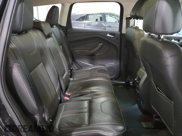 2013 Ford Escape Titanium with VIN 1FMCU9J93DUC84611, listed as a Copart auction lot 59046515 with 126,386 mi miles and Salvage title. Bid and sale history available at DreamBid. Image 11.