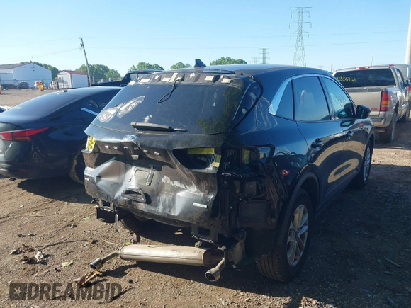 2020 Ford Escape SE with VIN 1FMCU0G61LUA29107, listed as a IAAI auction lot 42286796 with 76,033 mi miles and . Bid and sale history available at DreamBid. Image 4.