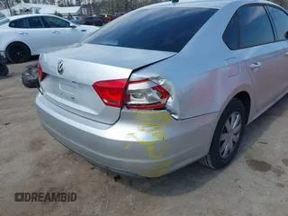 2013 Volkswagen Passat Wolfsburg Edition with VIN 1VWAH7A37DC132561, listed as a IAAI auction lot 41913353 with 125,709 mi miles and . Bid and sale history available at DreamBid. Image 6.
