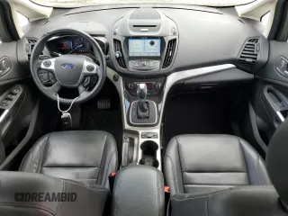 2016 Ford C-Max Energi SEL with VIN 1FADP5CU8GL103948, listed as a Copart auction lot 59968784 with 89,817 mi miles and Salvage Title. Bid and sale history available at carsss.com. Image 8.