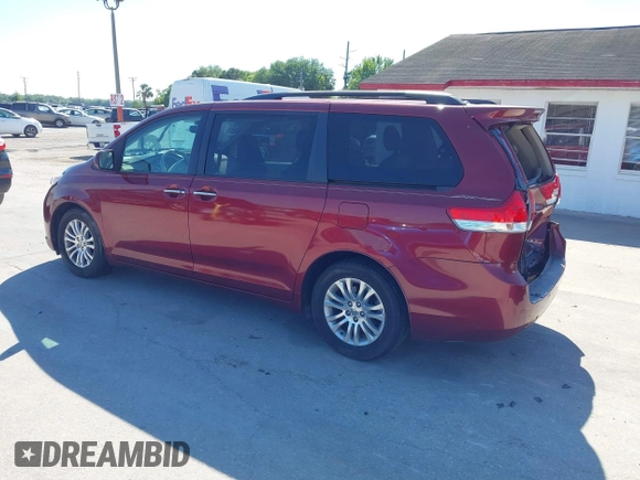2012 Toyota Sienna XLE AAS with VIN 5TDYK3DC8CS258612, listed as a IAAI auction lot 41899311 with 75,779 mi miles and . Bid and sale history available at DreamBid. Image 3.