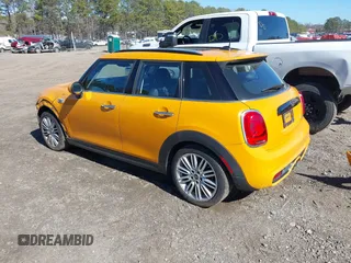2018 MINI Hardtop 4 Door Cooper S with VIN WMWXU3C53J2F50987, listed as a IAAI auction lot 41682930 with 70,938 mi miles and . Bid and sale history available at DreamBid. Image 3.
