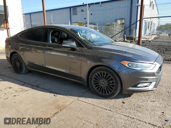 2018 Ford Fusion Titanium с VIN 3FA6P0D92JR192382, выставлен на аукционе Copart как лот 74065774 с пробегом 110 411 миль миль и Списание • Salvage title. История ставок и продаж доступна на DreamBid. Изображение 4.