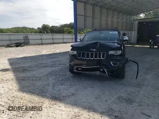 2015 Jeep Grand Cherokee Overland with VIN 1C4RJFCG0FC783375, listed as a Copart auction lot 61966725 with 191,478 mi miles and Salvage title. Bid and sale history available at DreamBid. Image 14.
