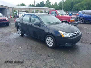 2009 Ford Focus S z VIN 1FAHP34N09W220485, wystawiony jako IAAI lot #42249397 z przebiegiem 68 869 mil mil oraz . Historia ofert i sprzedaży dostępna na DreamBid. Obrazek 1.