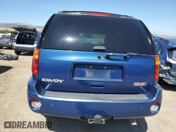 2005 GMC Envoy SLE with VIN 1GKDS13S452173325, listed as a Copart auction lot 61304205 with 155,501 mi miles and Clean title. Bid and sale history available at DreamBid. Image 6.