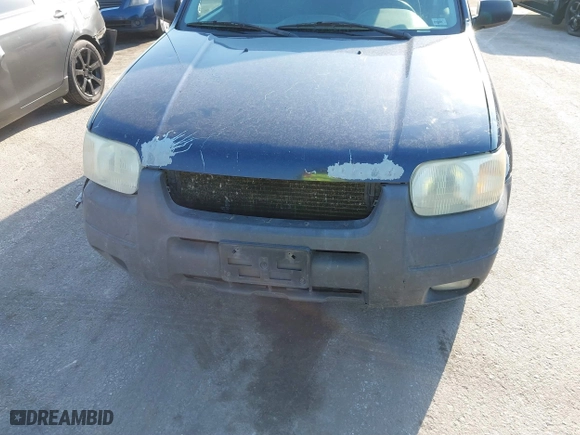 2003 Ford Escape XLT Popular 2 with VIN 1FMYU93103KE17610, listed as a IAAI auction lot 41766806 with 1 mi miles. Bid and sale history available at carsss.com. Image 6.