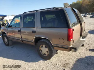 1996 Chevrolet Tahoe with VIN 1GNEK13R1TJ385350, listed as a Copart auction lot 77593884 with 169,178 mi miles and Salvage Title. Bid and sale history available at carsss.com. Image 2.
