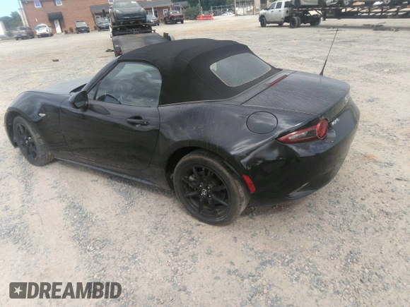 2021 Mazda MX-5 Miata Sport with VIN JM1NDAB73M0454064, listed as a IAAI auction lot 42613537 with 24,630 mi miles and . Bid and sale history available at DreamBid. Image 3.