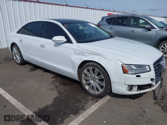 2015 Audi A8 4.0T with VIN WAU32AFD6FN039739, listed as a IAAI auction lot 41946401 with 102,668 mi miles and . Bid and sale history available at DreamBid. Image 1.